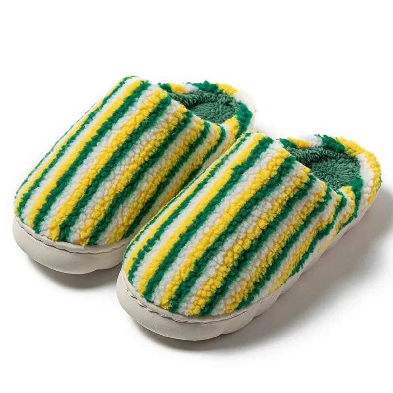 Fluffy slip-on slippers with green, yellow, and white striped pattern, cozy fit