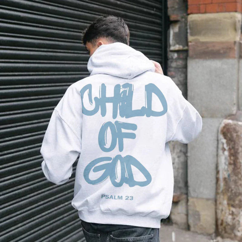 White oversized hoodie with blue graffiti text, streetwear style, relaxed fit