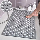 Gray non-slip PVC shower mat with large drainage holes, anti-skid and waterproof, bathroom use