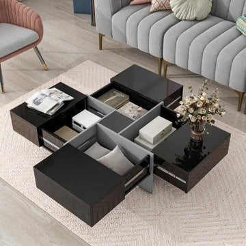 Modern black and gray sectional coffee table with glossy finish and hidden storage drawers in a living room