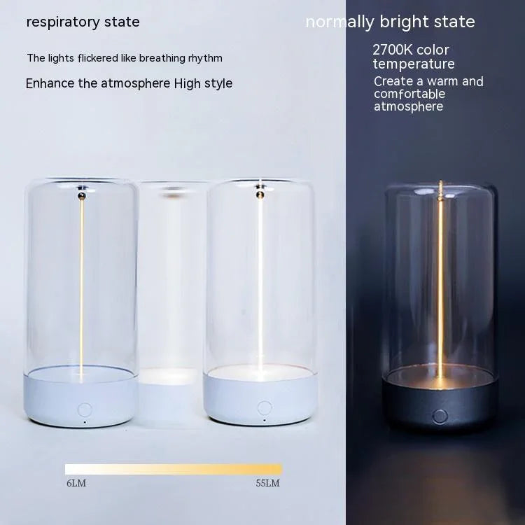 Modern cylindrical glass LED table lamp with white base, warm adjustable lighting, minimalist design.