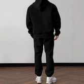 Black streetwear hoodie and sweatpants set, relaxed fit, thick material, back view