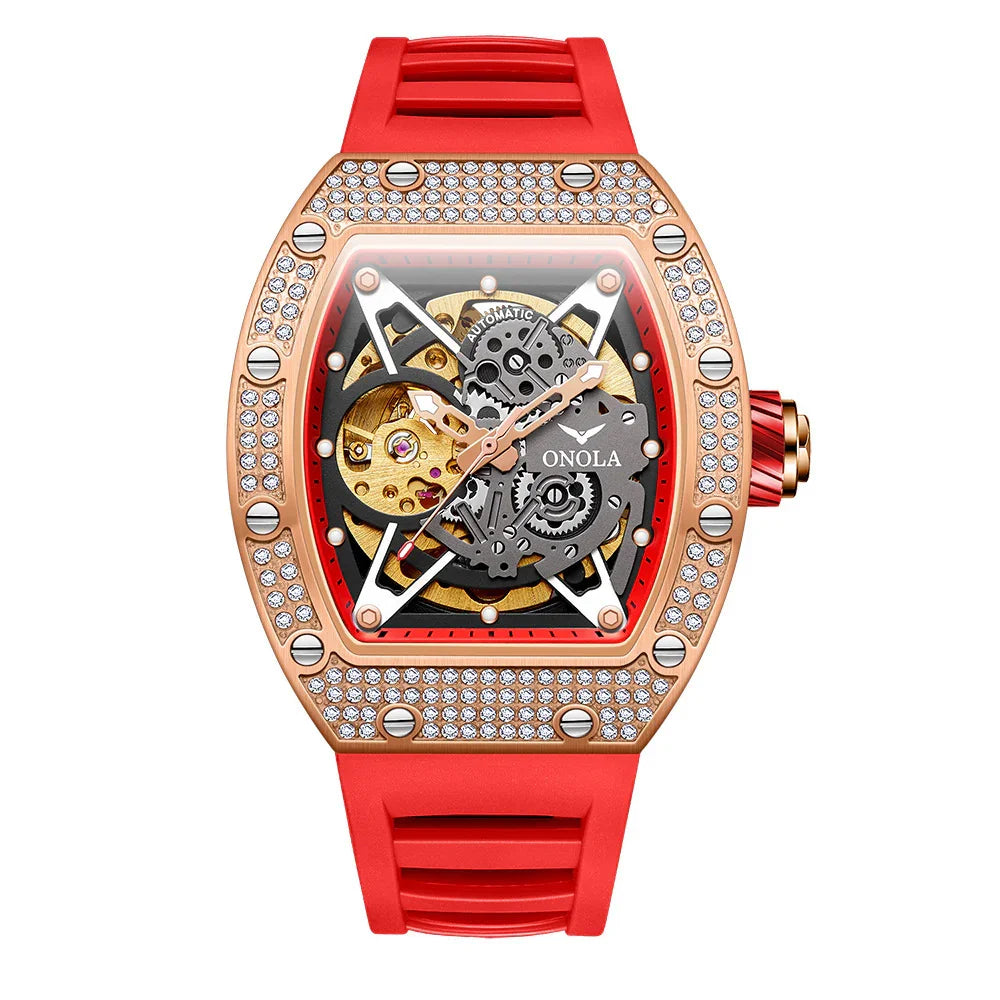 Red and gold skeleton watch with crystal accents, rubber strap, and mechanical dial