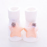 White ribbed baby socks with soft peach star decorations and delicate tulle accents
