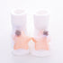 White ribbed baby socks with soft peach star decorations and delicate tulle accents