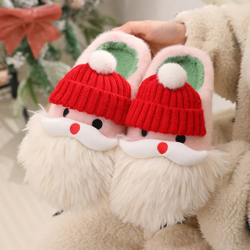 Cozy pink slippers with plush white beard, red knit hat, and green interior, Santa design