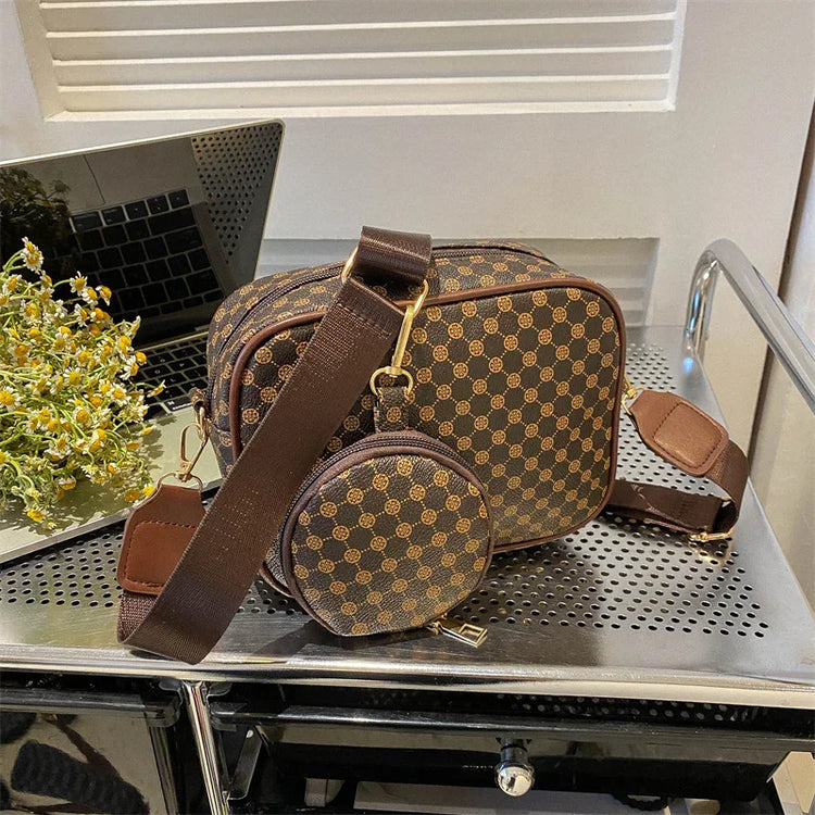 Brown geometric patterned crossbody bag with matching round coin pouch and adjustable strap