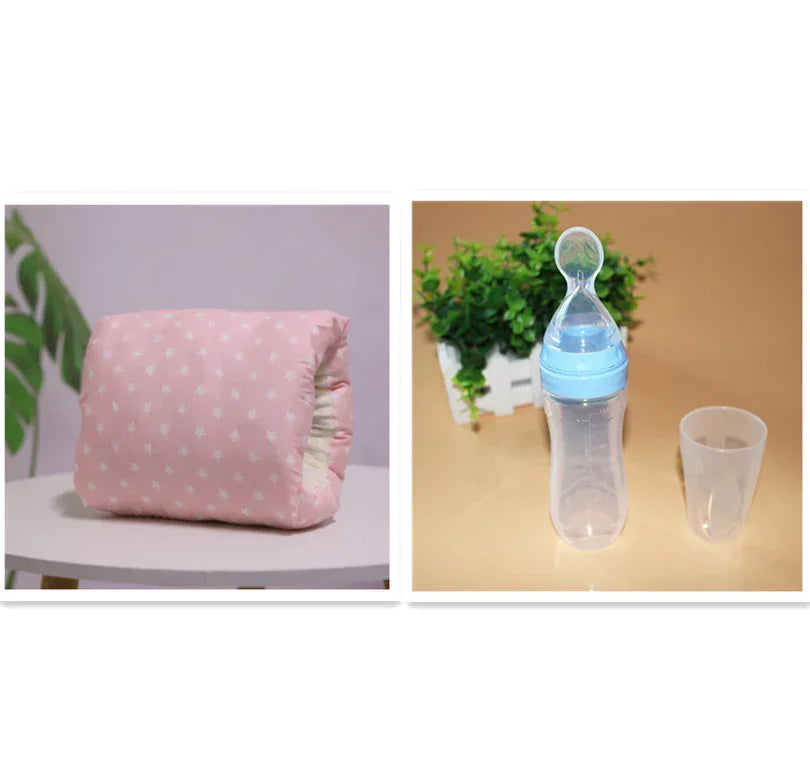 Pink polka dot quilted padded jacket and clear baby feeding bottle with blue cap.