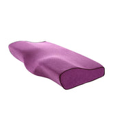 Purple ergonomic memory foam pillow with contoured design for neck and spine support