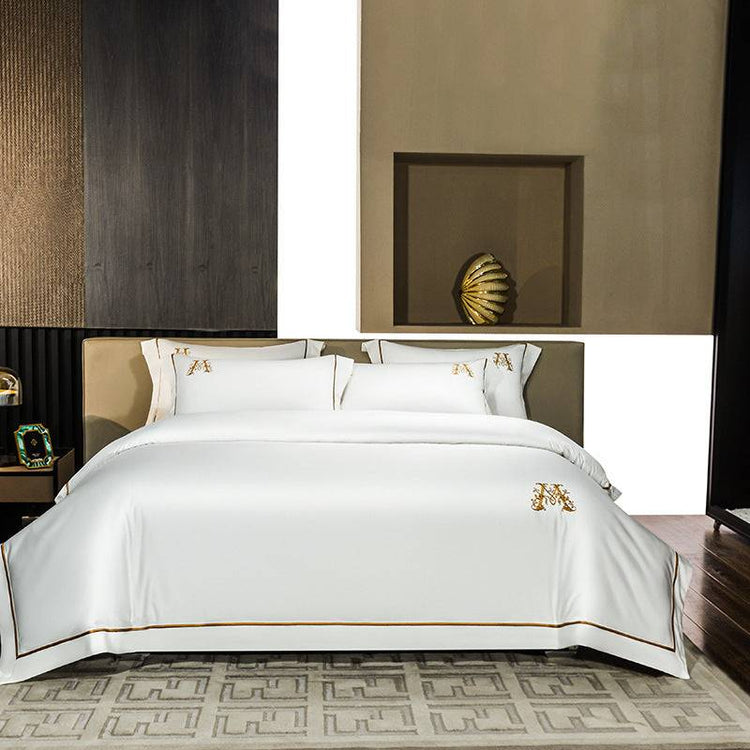 Cotton embroidery match sets white four-piece bed sheet set with brown trim on 1.5m bed in modern bedroom