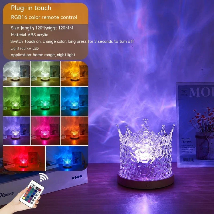Crystal acrylic crown night light with RGB color options on wooden table, modern decor