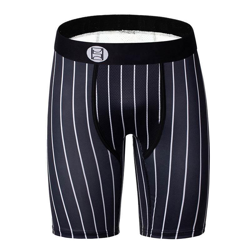 Men's black and white striped compression shorts with mid-length, athletic fit, and elastic waist.