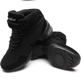 Black high-top sneakers with suede material, lace-up front, padded ankle, modern streetwear style.