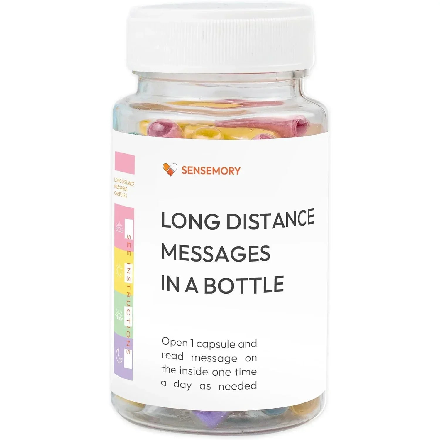 Clear plastic jar with white lid, colorful capsules inside, labeled 'Long Distance Messages in a Bottle'.