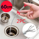 Flexible drain clog remover tool with spring grabber used in stainless steel kitchen sink