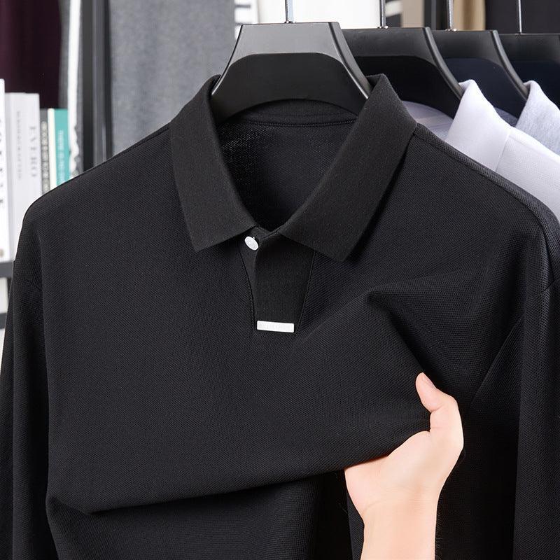 Black long sleeve polo shirt with textured fabric and regular fit, shown on hanger