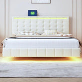Modern white upholstered bed with tufted headboard, LED lighting, and soft bedding.