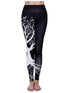 Black high-waisted leggings with white tree graphic, slim fit, stretchy material