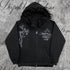 Black zip-up hoodie with faux fur hood, silver graphic designs, relaxed fit streetwear style