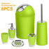 Green bathroom accessories set with metallic accents, includes bin, soap dispenser, toothbrush holder, cup, soap dish, toilet brush