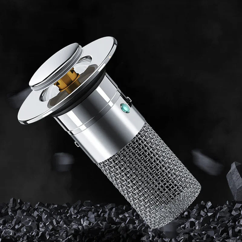 Futuristic silver metal drain filter with mesh body and pop-up top on black background
