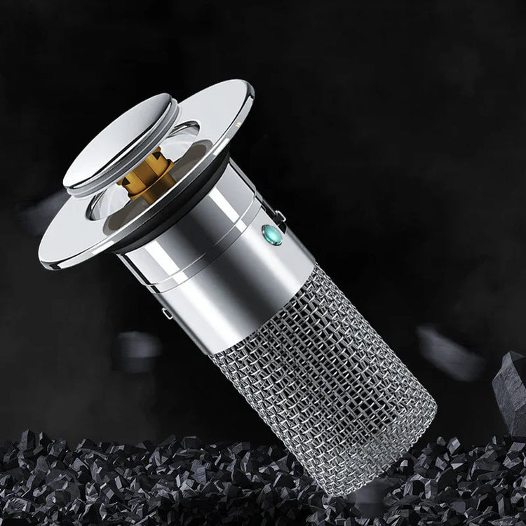 Futuristic silver metal drain filter with mesh body and pop-up top on black background