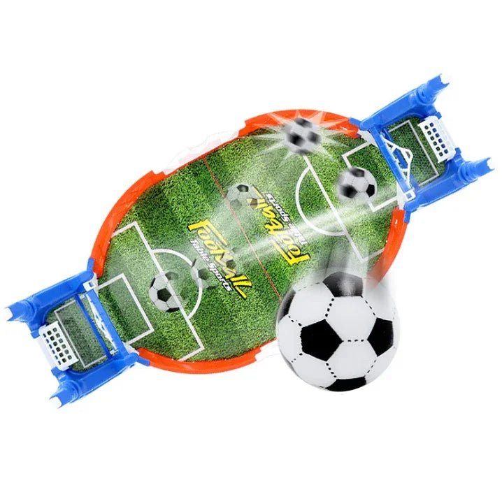 Mini tabletop soccer game set with green field, blue goals, and small soccer balls in action.