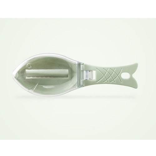 Fish-shaped kitchen tool with light green plastic handle and clear body, shown on white background.