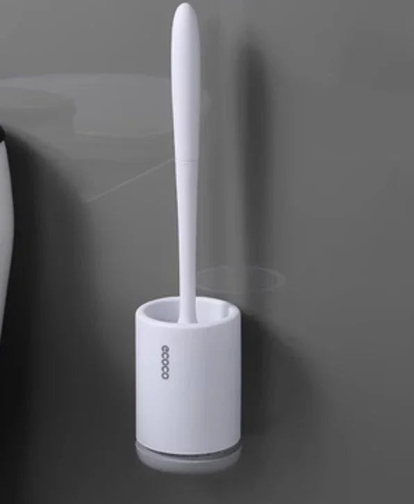 Minimalist white plastic toilet brush with holder, modern design, wall-mounted in bathroom
