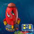 Red and yellow cartoon rocket-shaped sprinkler toy with shark face illustration, suitable for outdoor water play.