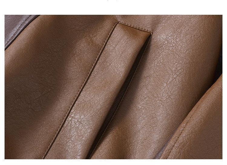 Close-up of brown faux leather jacket pocket, smooth texture, modern streetwear style