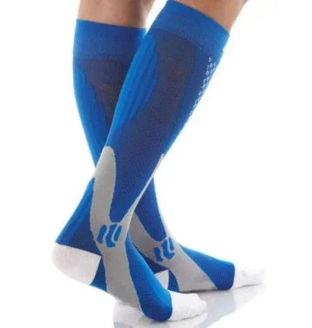 Blue and gray knee-high athletic compression socks with cushioned sole and snug fit