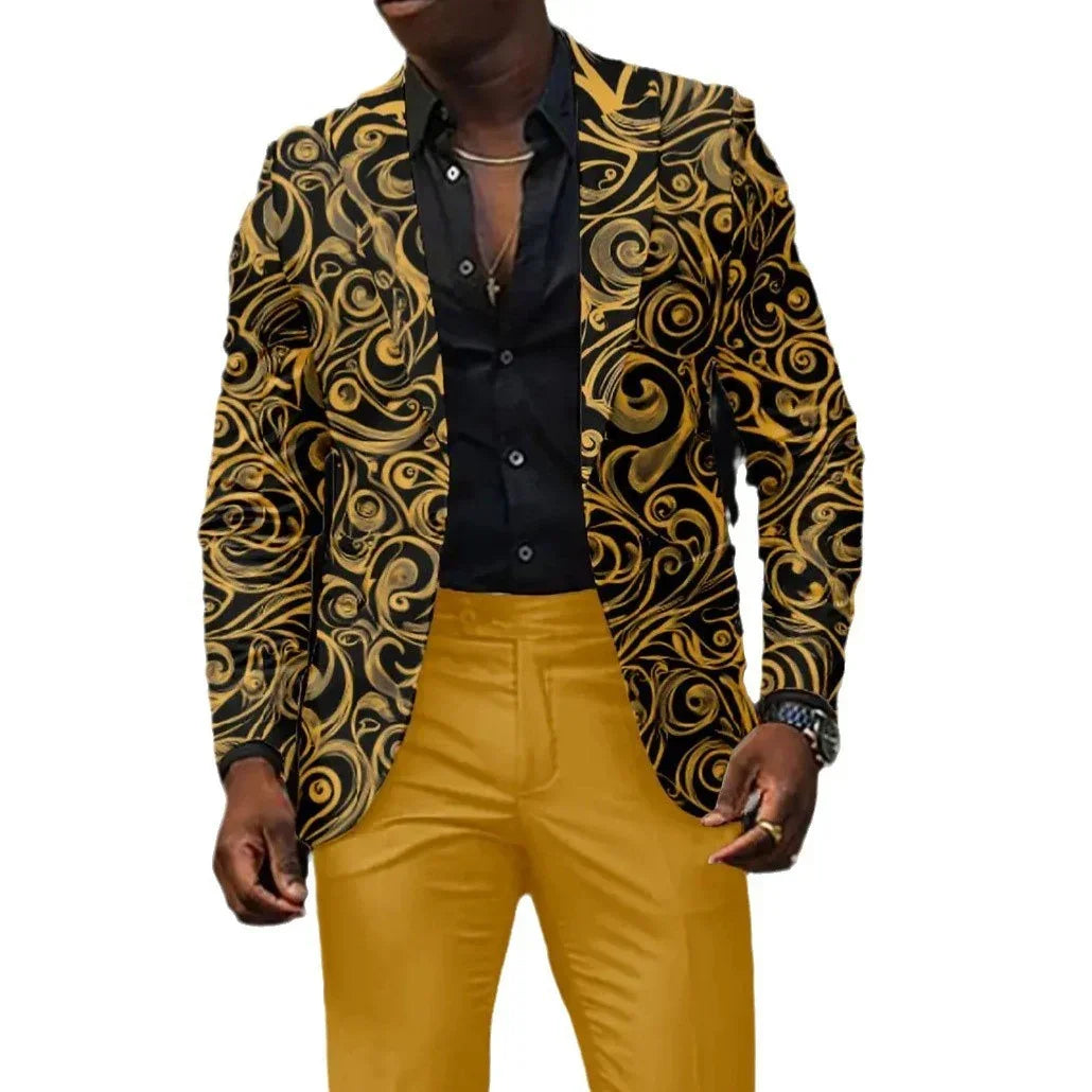 Man wearing a gold swirl patterned blazer, black shirt, and gold slim-fit pants