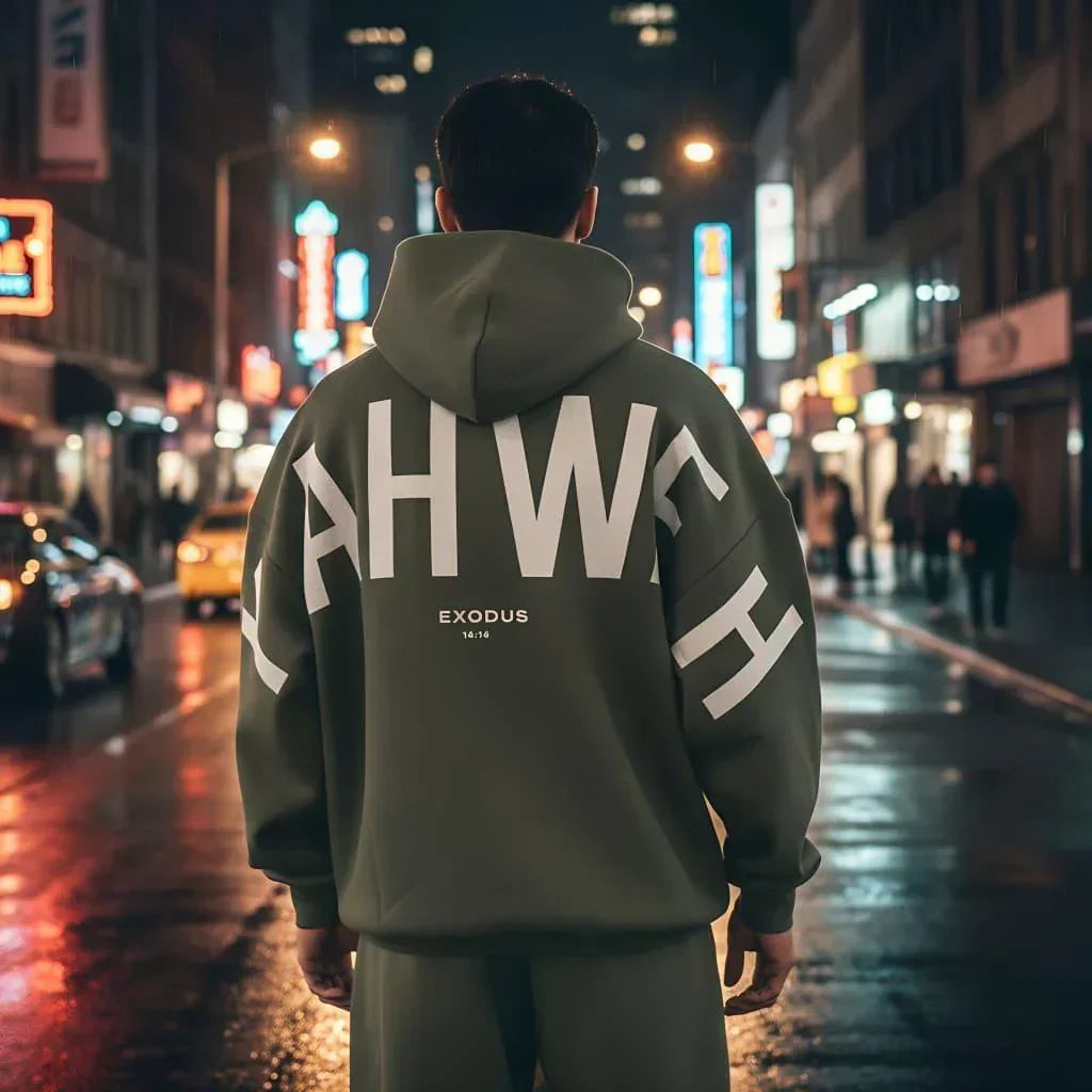 Oversized olive green hoodie with bold white lettering, streetwear style, relaxed fit