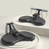 Black push-up board with foam handles, digital timer, and non-slip pads for home workouts