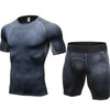 Black textured compression shirt and shorts set, form-fitting athletic wear with mesh pattern, ideal for gym or streetwear style.