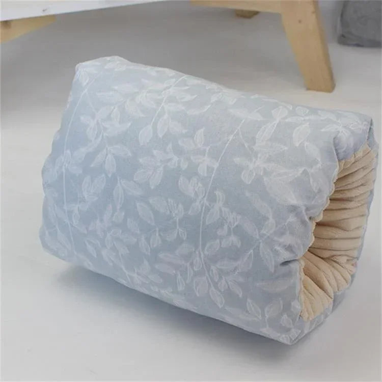 Light blue floral patterned pillow with soft fabric and plush, rectangular fit