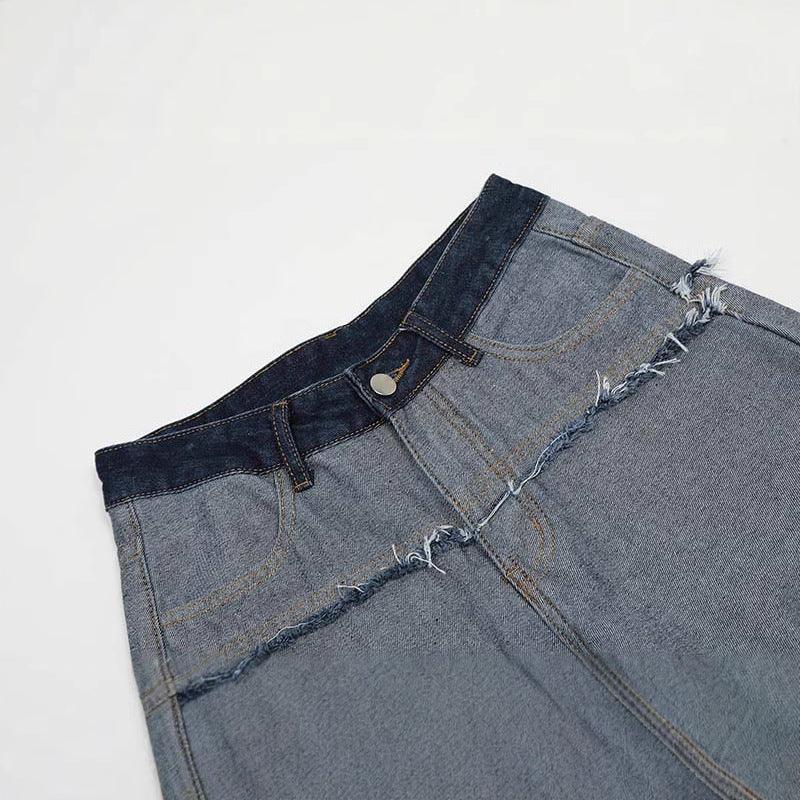 High-waisted blue denim skirt with raw frayed hem and contrast waistband, straight fit