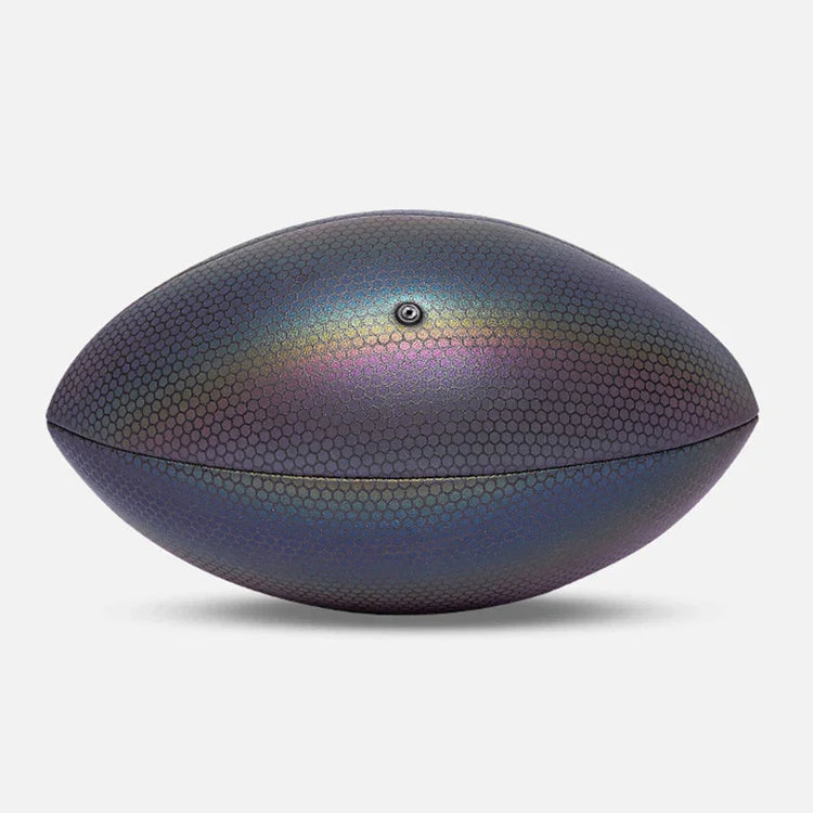 Iridescent textured football with hexagonal pattern and metallic finish on white background