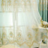 Sheer white lace curtain with gold floral embroidery and scalloped edges, elegant decor style
