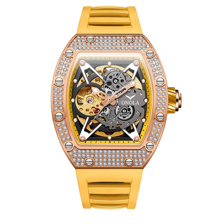 Gold-toned skeleton watch with crystal accents, rubber strap, and exposed mechanical gears