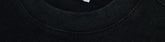 Close-up of black cotton crewneck sweatshirt with ribbed collar, relaxed fit