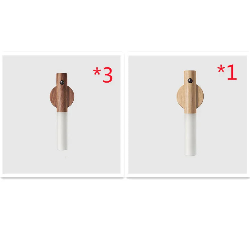 Minimalist wall sconces in dark and light wood with cylindrical white base, modern decor.
