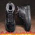 Black leather high-top winter boots with gray faux fur lining and chunky sole