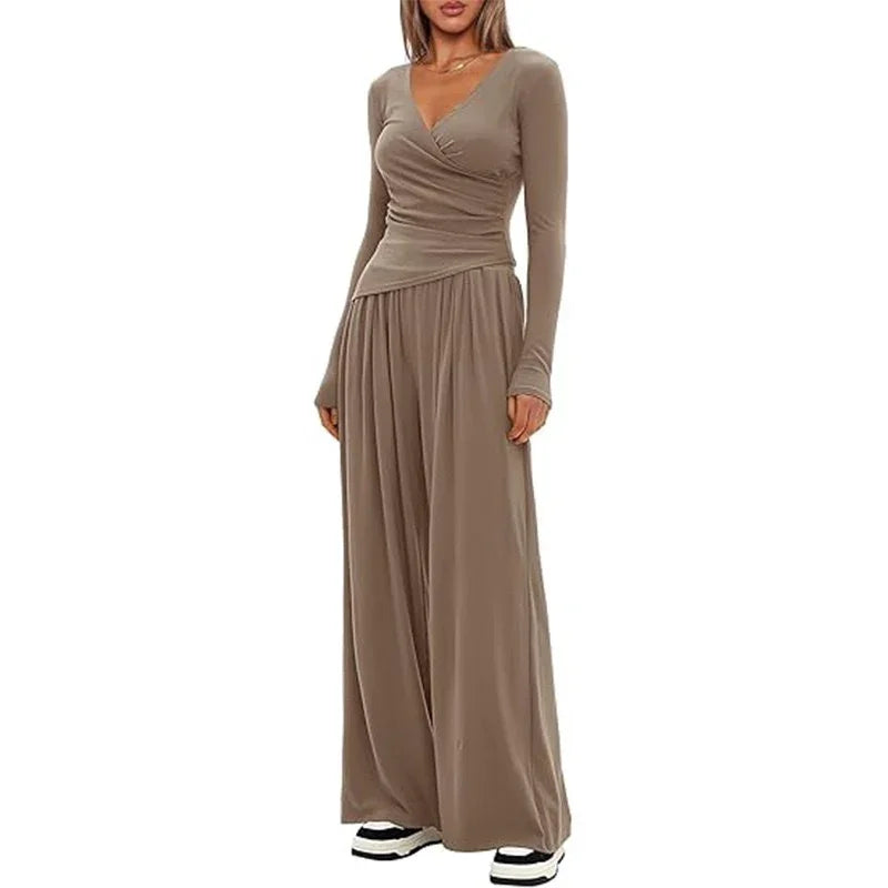 Taupe long sleeve wide leg jumpsuit with V-neck and relaxed fit, soft draped fabric