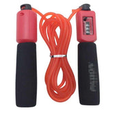 Red jump rope with foam grips and built-in counter, fitness accessory, durable plastic.