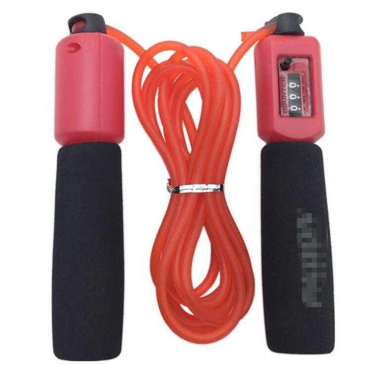 Red jump rope with foam grips and built-in counter, fitness accessory, durable plastic.