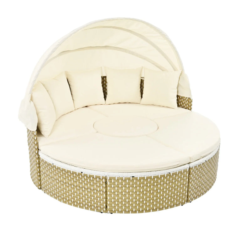 Beige round rattan outdoor daybed with canopy, plush cushions, and modern woven design.