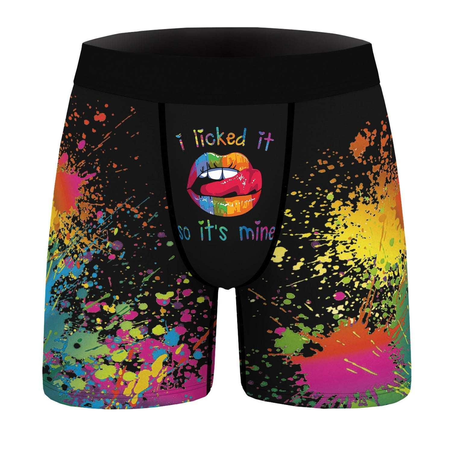 Men's black boxer briefs with colorful paint splatter, rainbow lips graphic, and snug fit