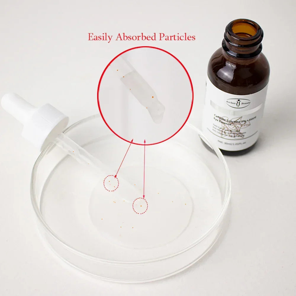 Clear dropper with small particles, brown glass serum bottle, and petri dish on white background